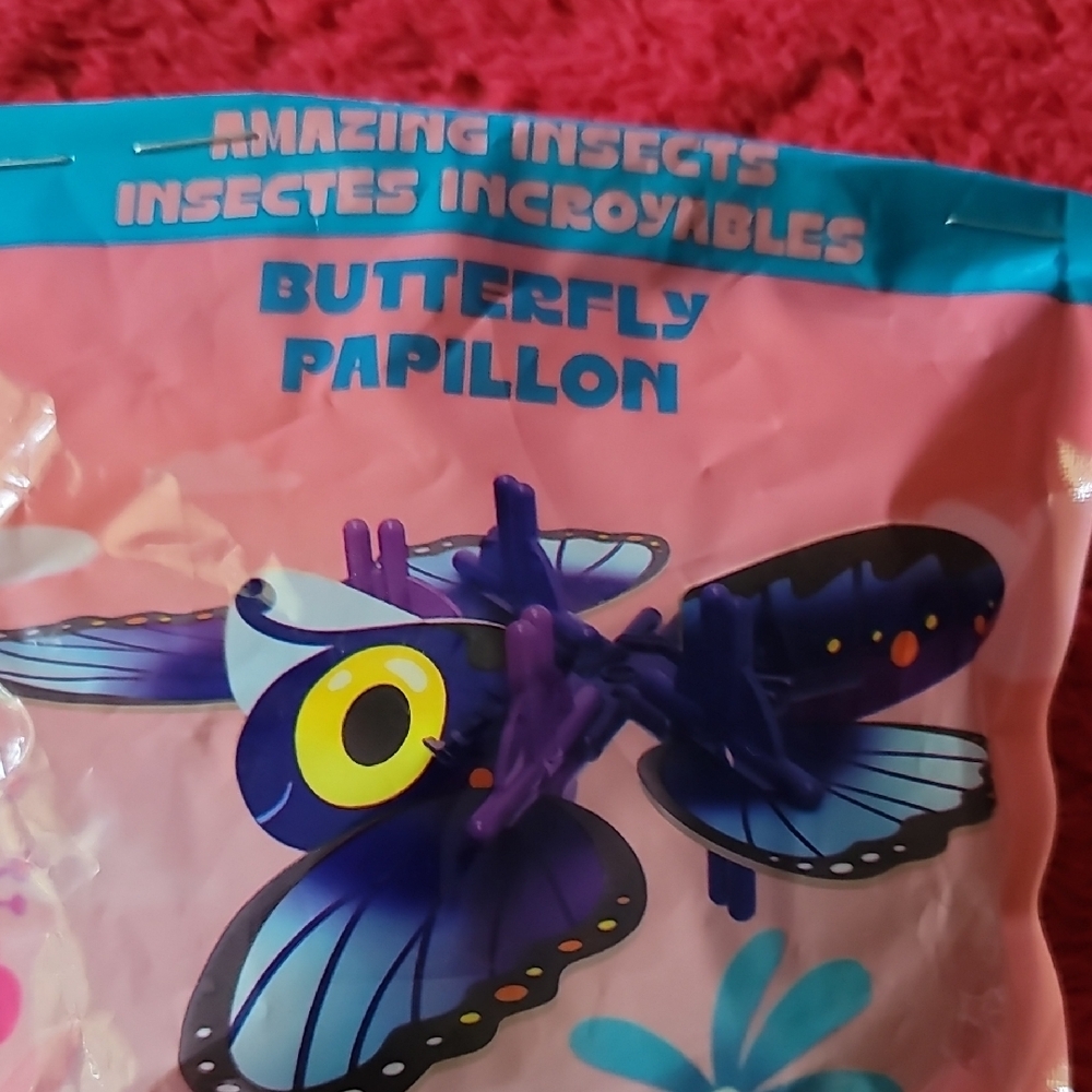 Smartlinks Amazing Insects" collection, specifically a butterfly, "PAPILLION"